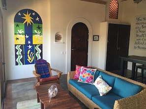 Casita entry and living room with queen size sofa couch