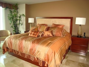 Guest bedroom with king bed and beautiful ocean views.