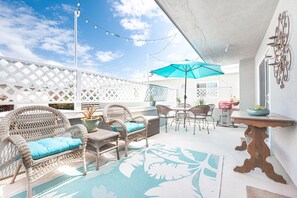 The rear private deck, accessed via both of the two bedrooms.
                