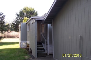 Back porch looking west at Sandridge Rd.