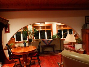 Arch to sun room with river view from all windows