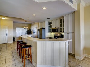 Kitchen with Breakfast Counter at 503 North Shore Place