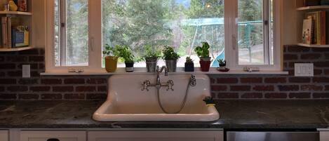 Luxury finishes, large farmhouse sink, and those views again!