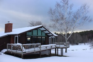 Rear view of the chalet -floor to ceiling windows facing west for sunset views