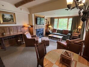 View of dining area and living room from the kitchen.