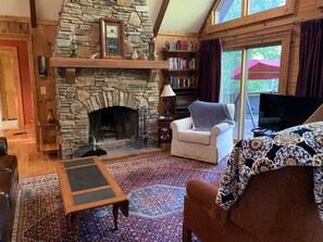 Living room, all new furniture, oriental rug, leather sofa