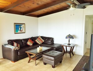 Comfortable space for watching TV, the ocean waves, and gorgeous sunsets.