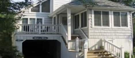 Front of beach house, under the shade trees but decks get sun!