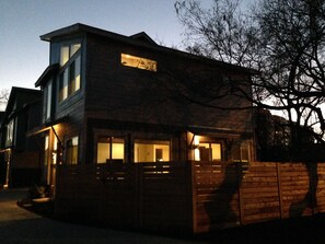 Exterior in the evening. Just steps away from Rainey St for a fun night out!