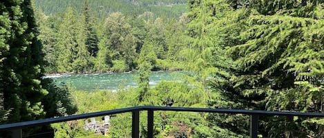 View of Skykomish River and Cascade Mountains from deck