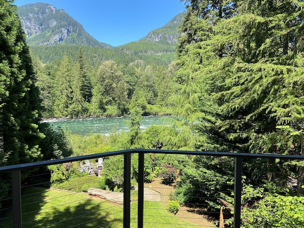 View of Skykomish River and Cascade Mountains from deck