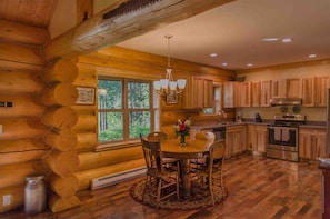 Living room open to dining and kitchen area