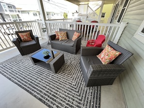 Covered porch with comfortable lounge area