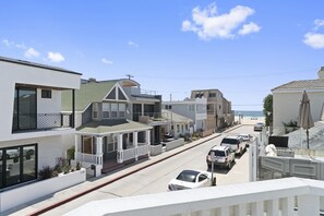 Ocean view from the small front balcony, one half block back from the 27th Street beachfront and boardwalk.
                