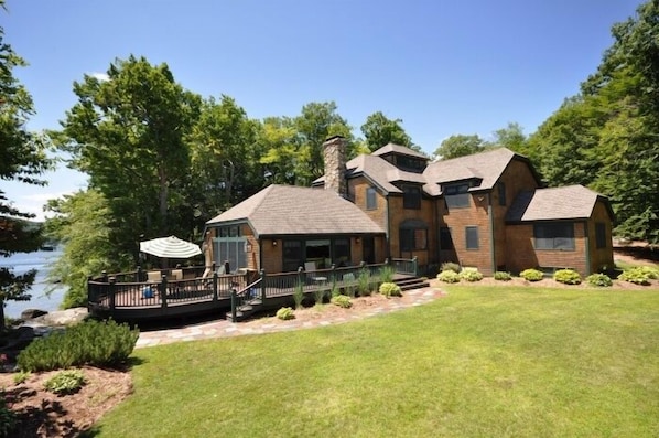 THE POINT HOME on 
Lake Winnipesaukee Waterfront yard