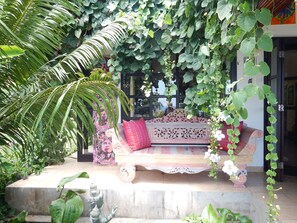 Comfy Lounger with views to the sea and in front ofthe Lotus Pond