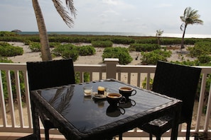 Enjoy a coffee at our bar height table with an unobstructed ocean view!

