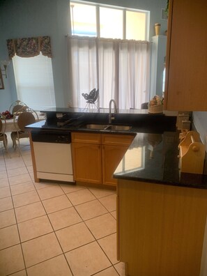 Kitchen with new granite countertops 