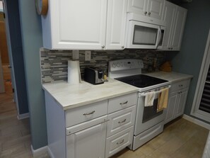 New backsplash to go with the beautiful new countertops and appliances. 