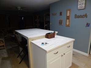 New table area with USB ports overlooking the living room and gallery 