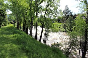 Spring/Summer view of Eagle River from virtually every window of home