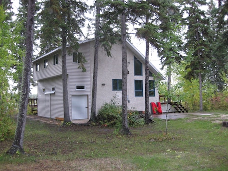 A view of the home as you approach from the road.