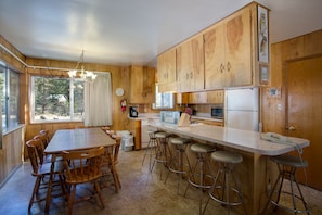 Kitchen with bar seating for 4