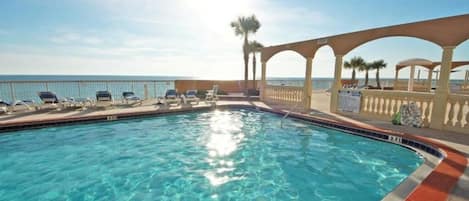 Take a dip in the resort's onsite pools and kiddie splash pad!