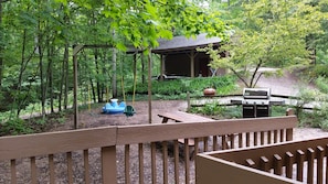View of play area, grills & picnic table from deck