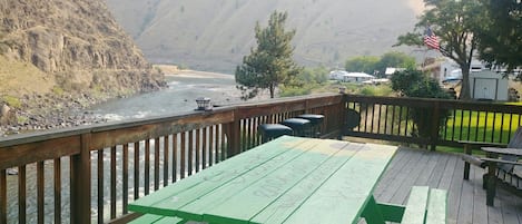 Relax on our big deck that overlooks the beautiful Salmon River