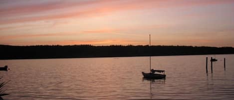 Sunset at the Beach house, enjoy while entertaining or resting in a hammock.