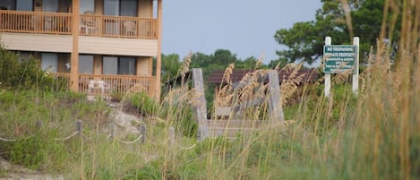 Looking back at our condo (corner right, 2nd floor) from the beach.