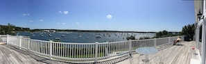 Huge decks w/breathtaking views overlook Swimming Pool, Harbor, Ass. Dock Beach