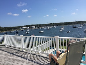 Dr.Lowney taking it in! Stroll waters edge to Chart Room,seen here across Harbor