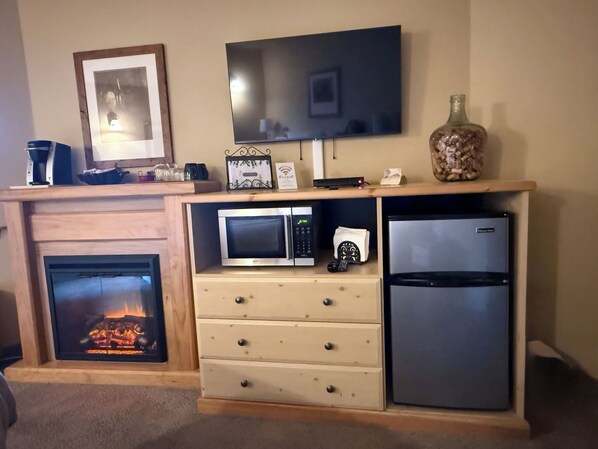 Fireplace, microwave, fridge, Keurig and streaming flat screen TV