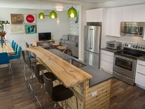 Open living, dining and kitchen make this rental ideal for large groups!