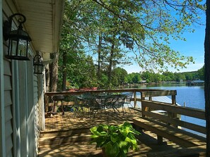 Deck off the front of the house. 