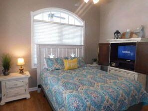 Master bedroom with tv