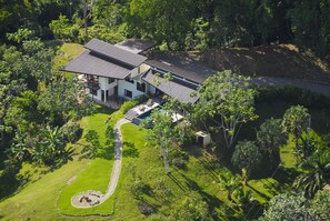 to Lattice House, surrounded by jungle. 