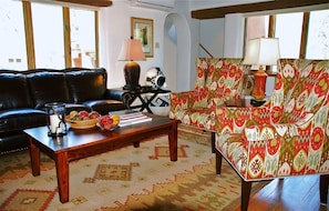 Main Living Room with Designer Ikat Fabric on Wingback Chairs