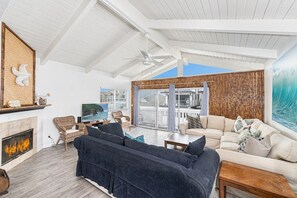 Spacious living areas open up to the front balcony of this upper 3 bd/2 ba ocean view unit.
                