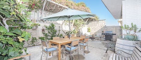 The private back patio is ideal for morning coffee, a good book, and evening cook outs.