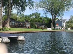 Swim dock with ladder and both lake rentals in photo. 