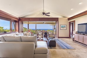 Living area with ample seating and ocean views.