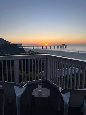 Sunrise over the pier. A great way to start your day with a cup of coffee. 