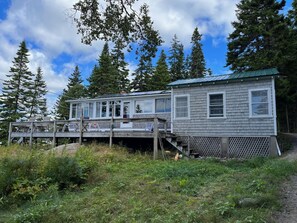 The room on right is the main bedroom. We added new metal roofs recently.