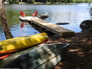 Waterfront, row boat, 2 single kayaks, double kayak