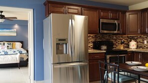 A view of the Kitchen and Master Bedroom