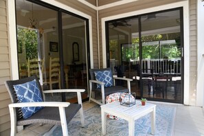 Side covered deck, great for morning coffee 