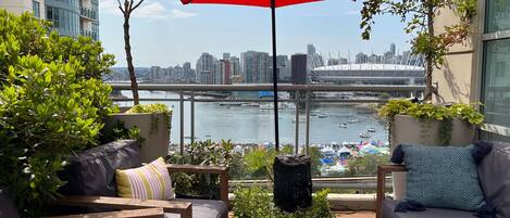 Patio off the dining room with water feature and gorgeous view of False Creek.